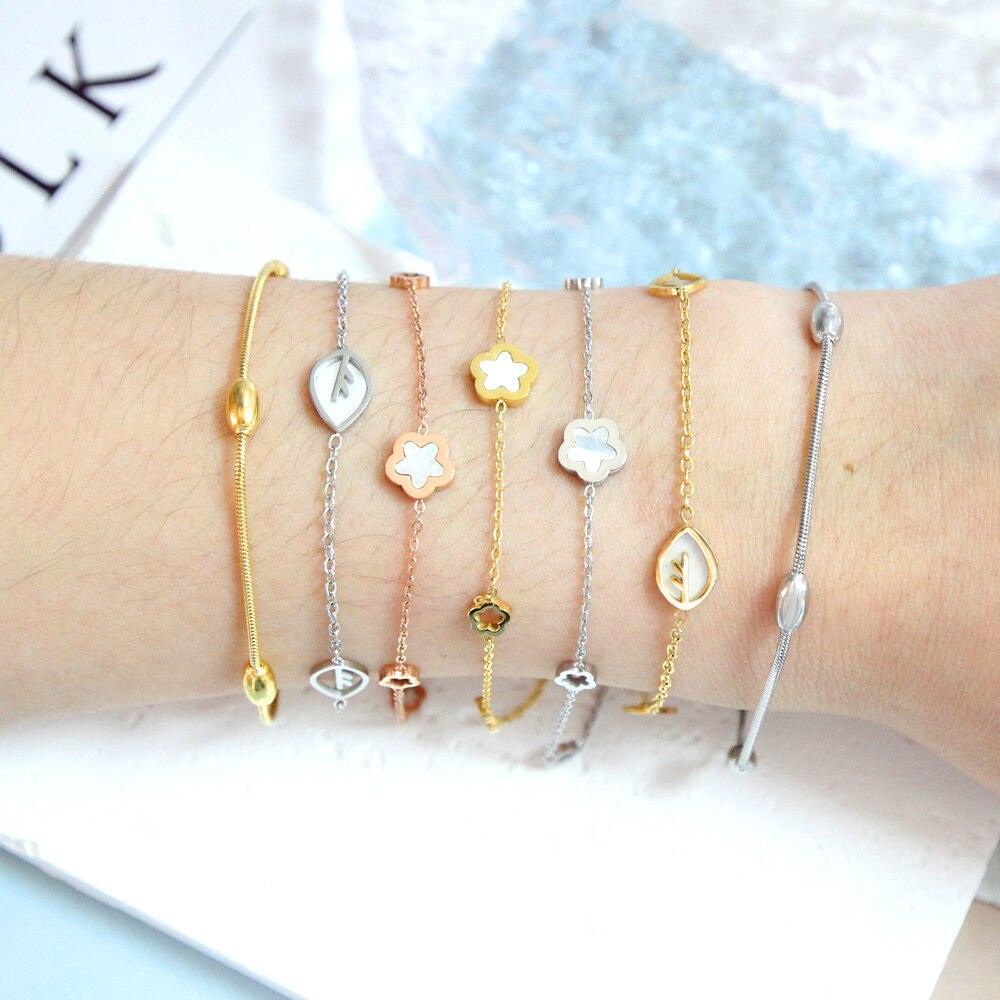 Elegant White Shell Charm Bracelet For Women - Hollow Flower Chain Stainless Steel Luxury Jewellery  - The Jewellery Supermarket
