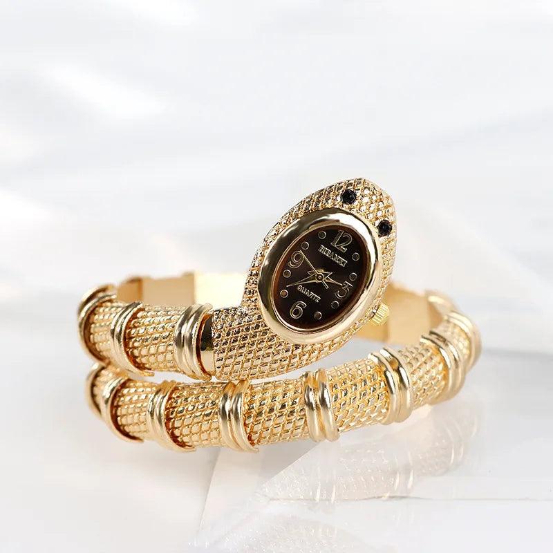 Classic Creative Design Snake Shape Watch for Women. Gold Bracelet Bling bling Diamonds Quartz Ladies Watches