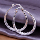 High Quality Fashion Silver Plated Elliptical Fish Ripple Hoop Earrings - The Jewellery Supermarket