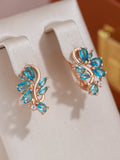 New Personality 14K Rose Gold Rolled Bright Blue AAA Zircon Crystals Hollow Charm Curve Symmetrical Buckle Earrings