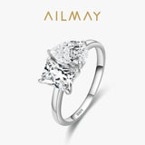 Dazzling Princess and Pear Cut AAAA Lab Created Diamonds Sterling Silver Ring