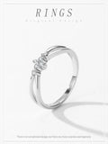Pleasing Geometric Crossed Line AAAA Lab Created Diamonds 925 Silver Ring