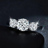 Superb 3 Stone 2/4 Carat VVS1 D Colour Moissanite Diamonds 18KGP Silver Ring