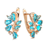 New Personality 14K Rose Gold Rolled Bright Blue AAA Zircon Crystals Hollow Charm Curve Symmetrical Buckle Earrings