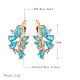New Personality 14K Rose Gold Rolled Bright Blue AAA Zircon Crystals Hollow Charm Curve Symmetrical Buckle Earrings