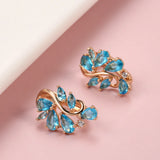 New Personality 14K Rose Gold Rolled Bright Blue AAA Zircon Crystals Hollow Charm Curve Symmetrical Buckle Earrings