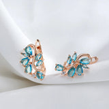 New Personality 14K Rose Gold Rolled Bright Blue AAA Zircon Crystals Hollow Charm Curve Symmetrical Buckle Earrings