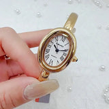 Famous Brand Fashion Luxury Gold Plated Women Quartz Watch - Ladies Gift Rome Numerals Dial Bracelet Watch