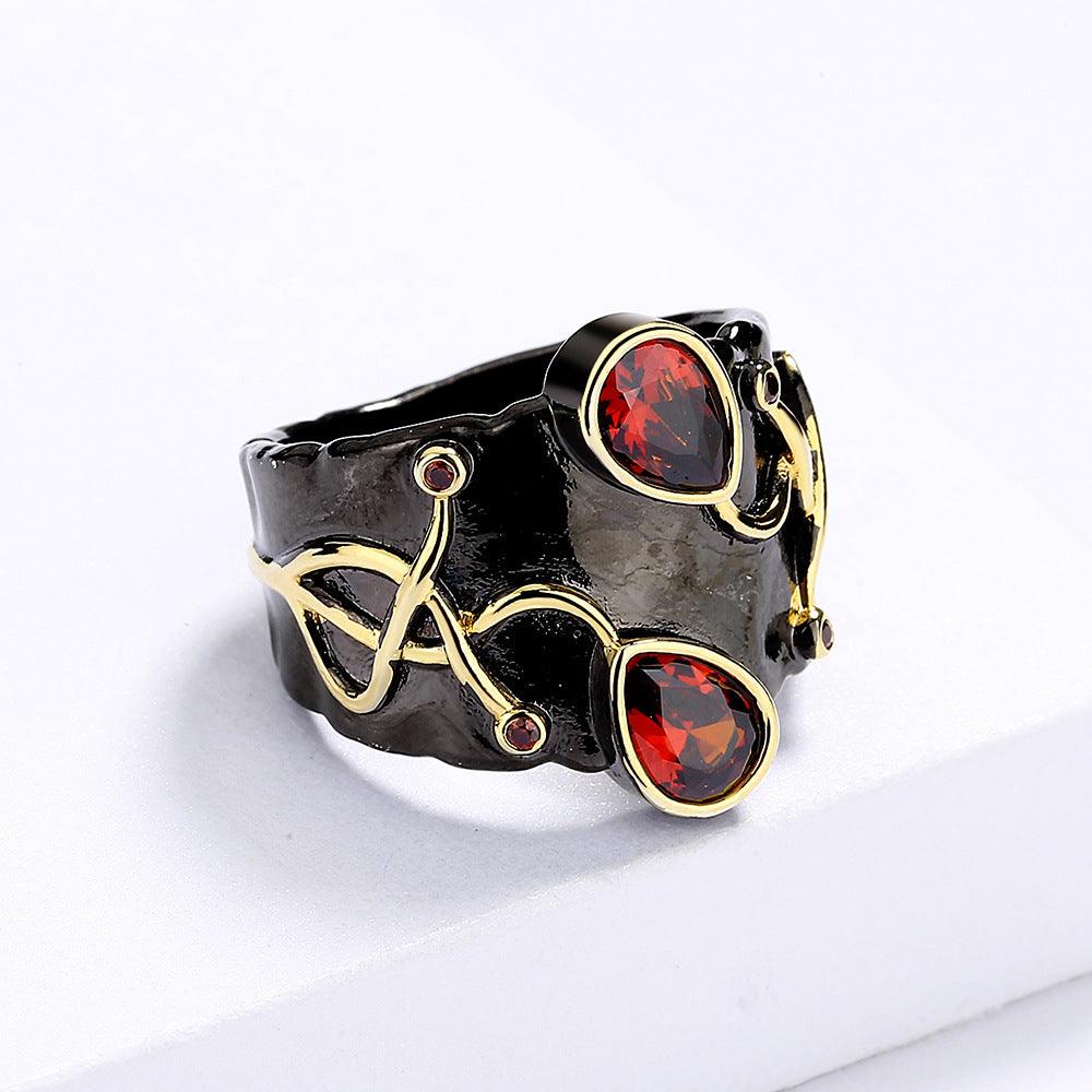 Exquisite Gold Winding Design Red AAA+ Zircon Crystals Creative Black Gold Colour Ring - The Jewellery Supermarket