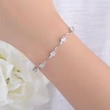 Best Gift Ideas - Fashionable Wave shaped with AAA+ Cubic Zirconia Diamonds Bracelet for Women - The Jewellery Supermarket